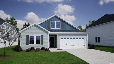 View of front of home with a garage and a front yard | Image 1