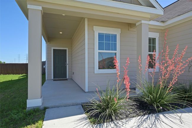 View of exterior entry featuring fence and a lawn | Image 5