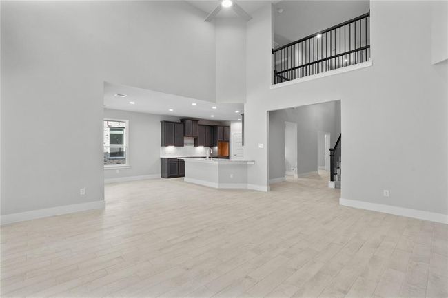 This photo is for illustrative purposes only and is not to be considered an exact replica of the finished home. Rendering does not match the finished product in terms of features, colors, landscaping, etc. Pricing, specifications, square footage and materials are subject to change at any time and without notice. | Image 7