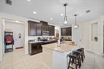 133 Wood Stork Lane, House other with 4 bedrooms, 3 bathrooms and null parking in Palm Coast FL | Image 3