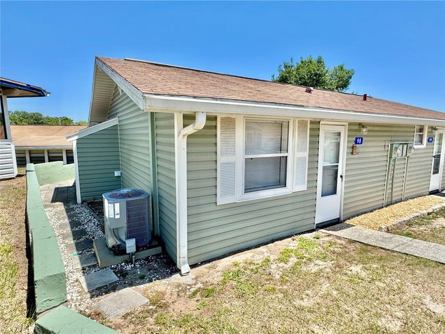 Front view of unit 98 with reserved parking right in front of unit. NO stairs | Image 33