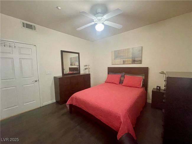 Carpeted bedroom featuring visible vents and a ceiling fan | Image 41