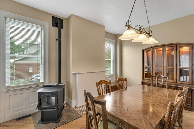 a pellet stove is centrally located in the home and is a great supplemental heat source! | Image 17