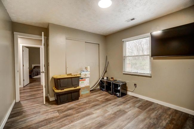 Spacious bedrooms, overhead lighting recently added | Image 16