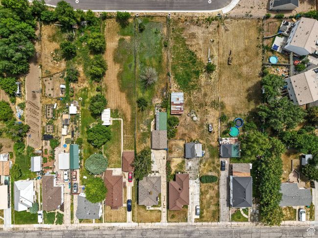 Aerial view of property and surrounding area with nearby suburban area | Image 26