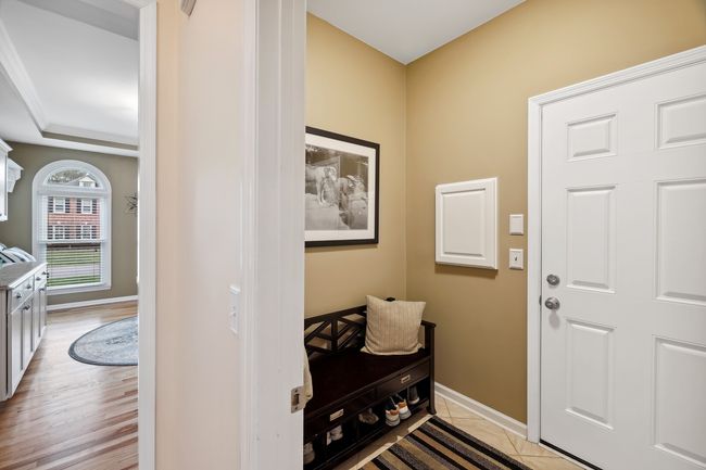 Entryway from the 3-car garage gives you a space to leave your shoes and bags. | Image 16