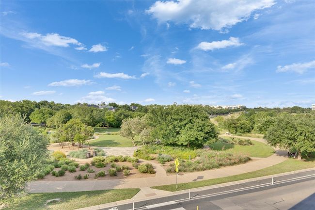View of property's community with view of wooded area | Image 35
