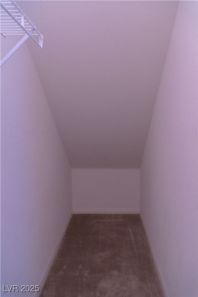 Additional living space with baseboards, lofted ceiling, and carpet | Image 18
