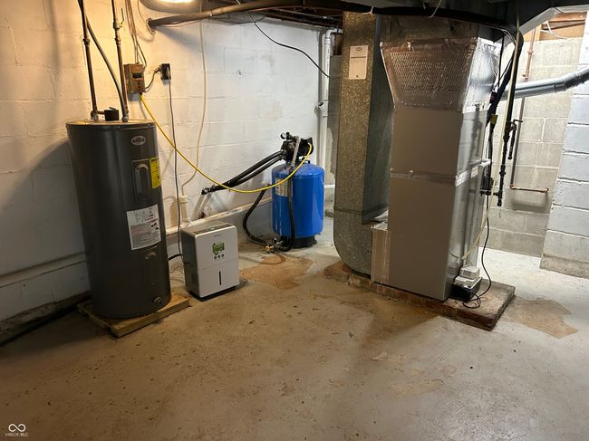 Gas furnace, electric water heater. Home used to be on well, now on citywater. However, not sure if well is still connected to something (outdoor spigots would be ideal!). | Image 50