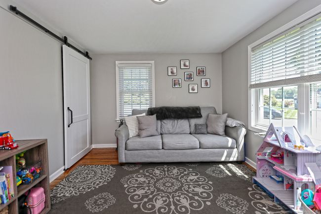 Located on mail level- this room could be dining room, playroom or an office. | Image 16