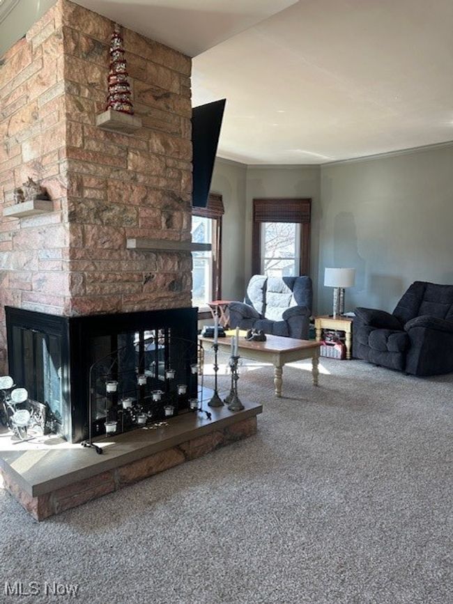 Living room with fireplace | Image 7