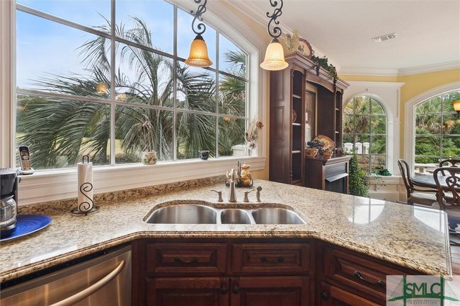Tons of natural light flow throughout the house. | Image 14