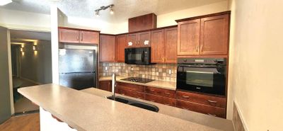 407 - 3101 34 Ave Nw, Condo with 1 bedrooms, 1 bathrooms and 1 parking in Calgary AB | Image 1