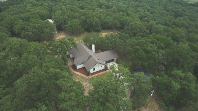 View of property location with a forest | Image 23