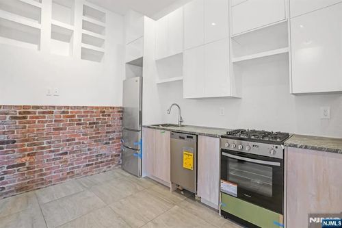 9009 Riverside Pl, North Bergen, NJ, 07047-6261 | Card Image