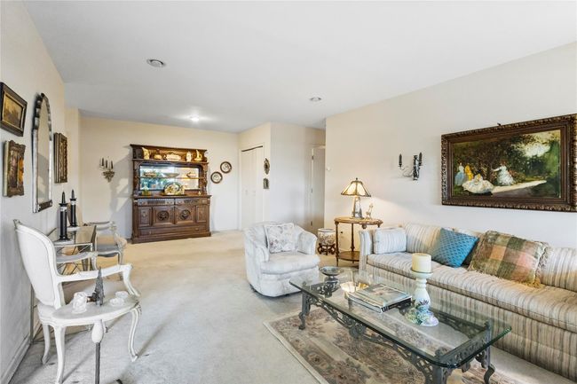 View of carpeted living area | Image 14