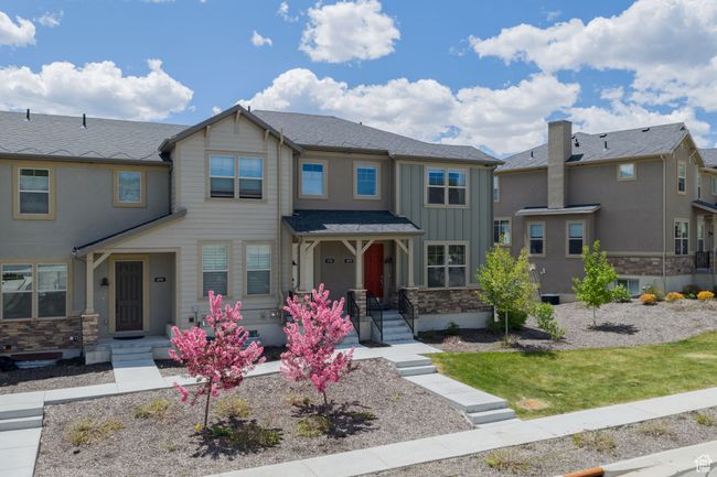 View of front of property featuring board and batten siding and stone siding | Image 40