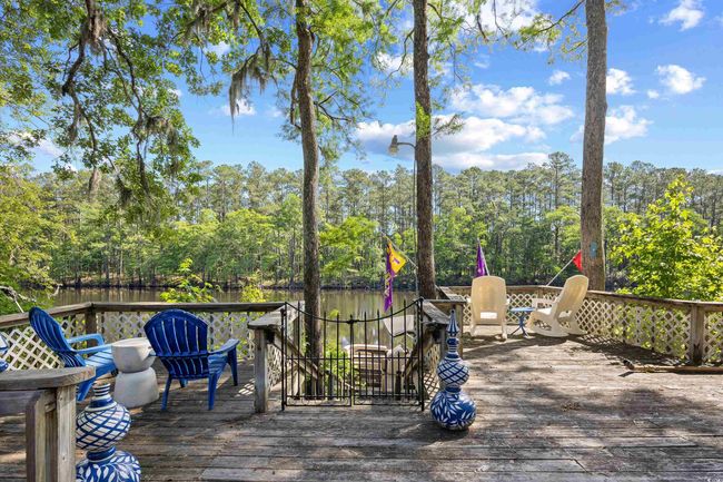 Wooden deck featuring a water view | Image 37