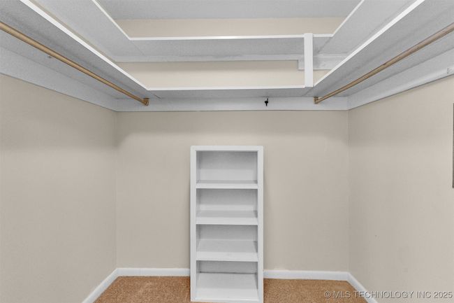 Large closet in primary bedroom | Image 12