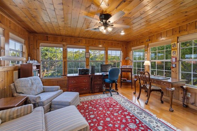A second office or bedroom is located down the hall from the owners primary bedroom. Current owners use this space as a second office. | Image 25