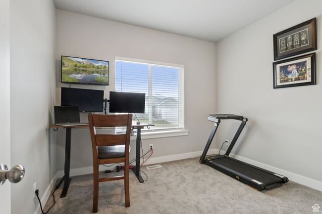 Carpeted home office with baseboards | Image 10