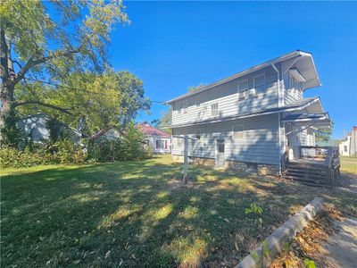 Rear view of property featuring a lawn | Image 3