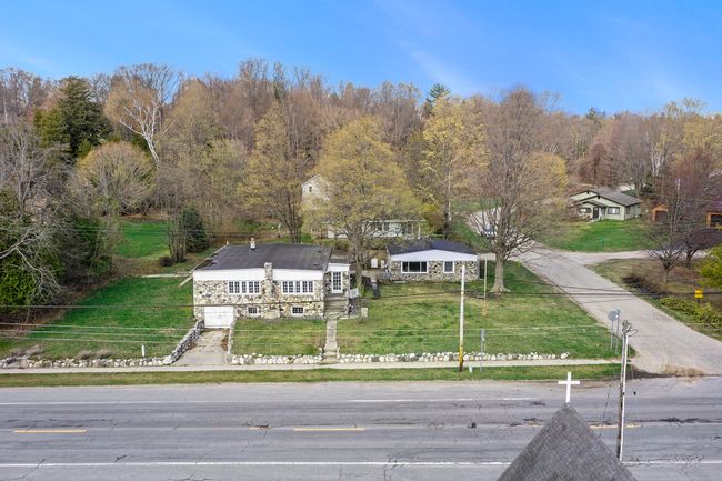 4642 Main St, House other with 8 bedrooms, 5 bathrooms and null parking in Onekama MI | Image 4