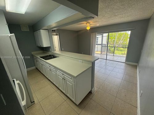 h-4519 Treehouse Ln, Tamarac, FL, 33319-3330 | Card Image