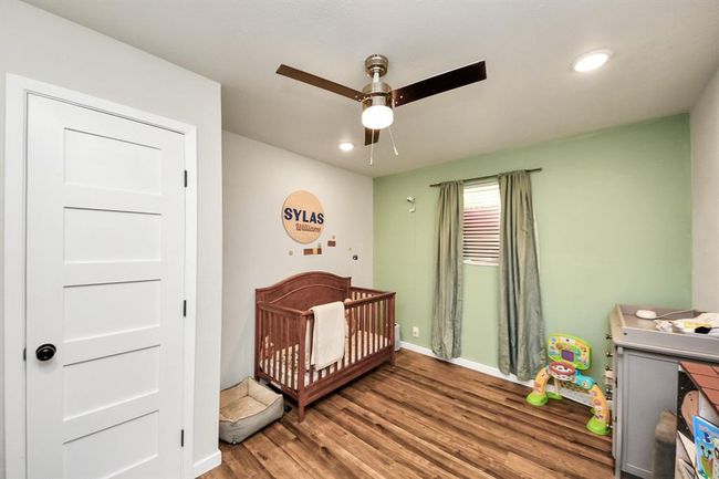 Perfectly sized for kids, guests, or a nursery—this secondary bedroom offers comfort and flexibility. | Image 21