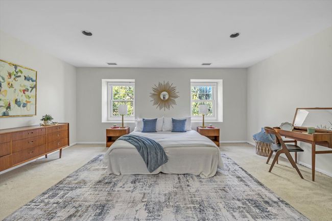 Bedroom with light carpet | Image 11