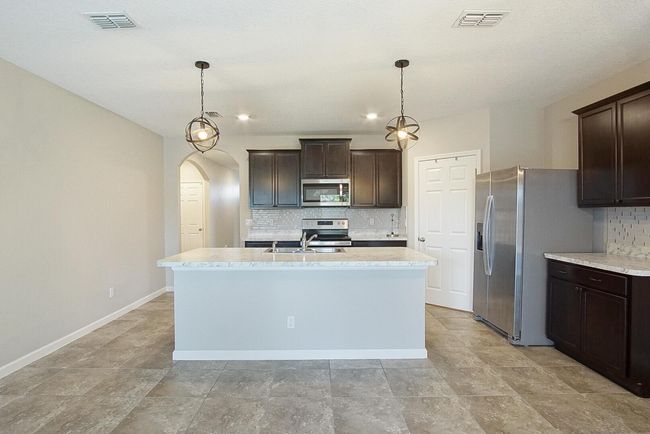 1672 Sw Bascom Ave, House other with 4 bedrooms, 2 bathrooms and null parking in Port Saint Lucie FL | Image 5