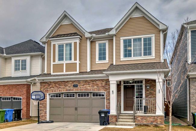 153 Carrington Close Nw, Home with 4 bedrooms, 3 bathrooms and 4 parking in Calgary AB | Image 1