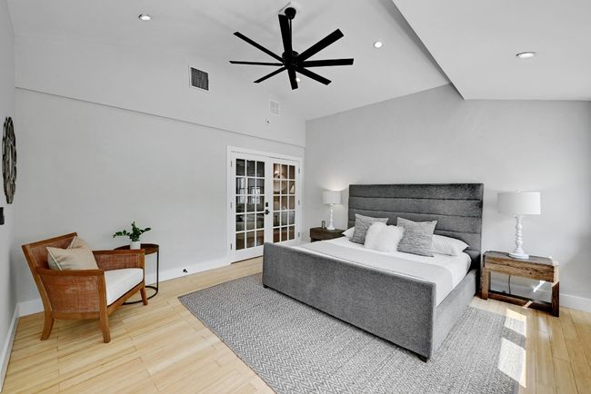 Large 2nd Bedroom with wood floors, and french doors | Image 21