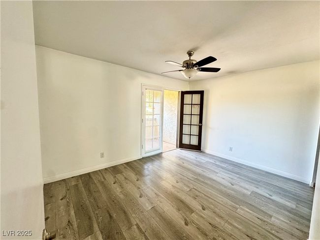 Secondary- Unfurnished room with wood finished floors and ceiling fan | Image 23