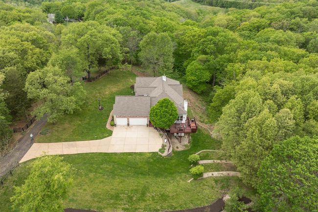 Drone / aerial view featuring a forest view | Image 60