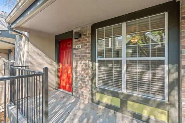 Entrance to property featuring brick siding | Image 6
