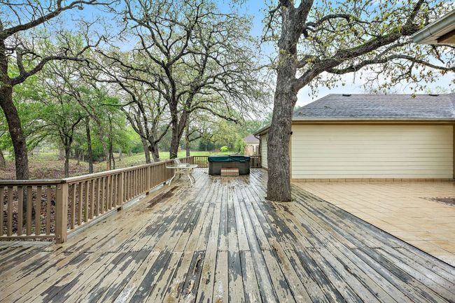 Back deck with a hot tub | Image 23