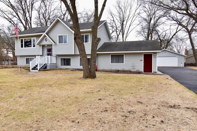 Walk out lower level to garage | Image 6