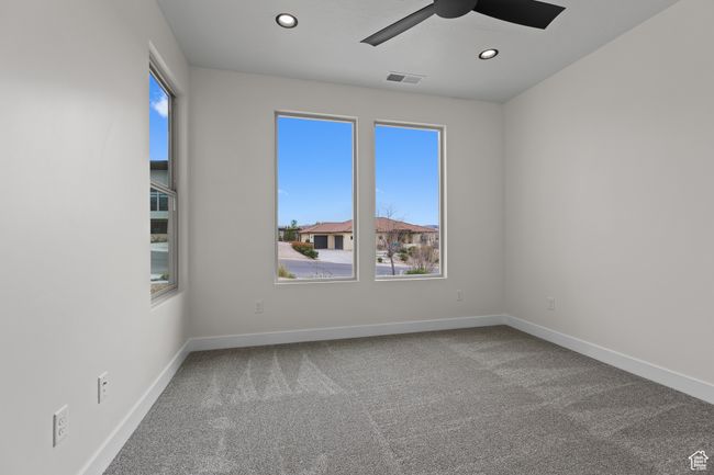 Carpeted spare room with baseboards, visible vents, recessed lighting, and a ceiling fan | Image 27