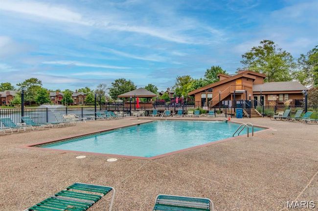 Community pool featuring a patio area | Image 52