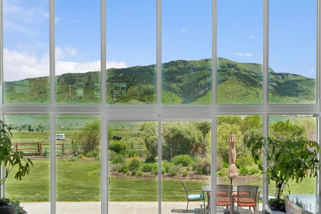 View of unfurnished sunroom | Image 8