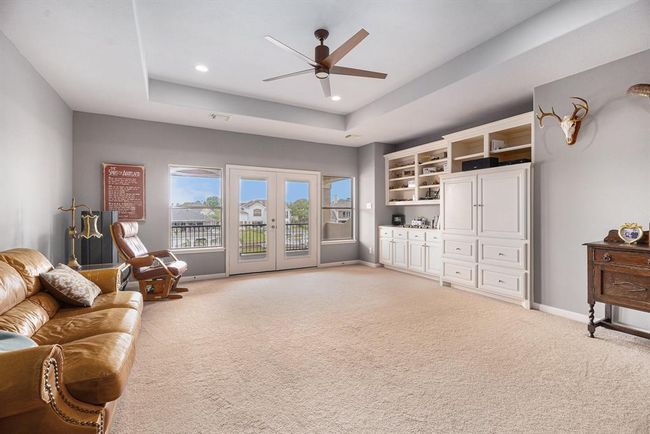 Upstairs gameroom with built-ins and private balcony | Image 32