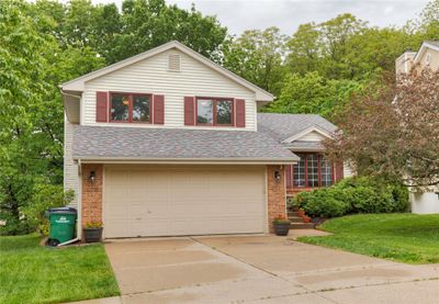 6920 Mill Pond Drive, Home with 3 bedrooms, 2 bathrooms and null parking in Urbandale IA | Image 2