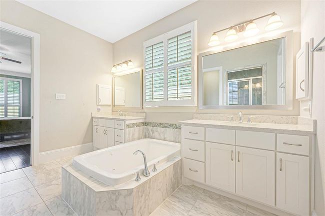 Neutral tones and ample natural light make this space feel open and serene—ready for a personal touch or spa-inspired upgrades. | Image 29