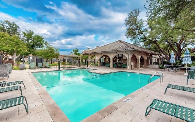 Community pool featuring a patio and a gazebo | Image 19