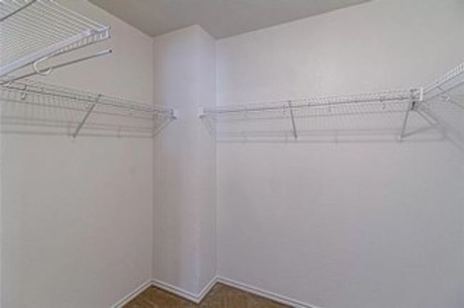 View of spacious closet | Image 11