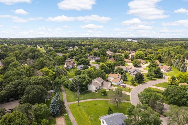 Aerial view of home and path that leads to Andrews Park. | Image 11