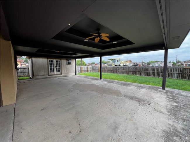 View of patio / terrace featuring french doors and ceiling fan | Image 13