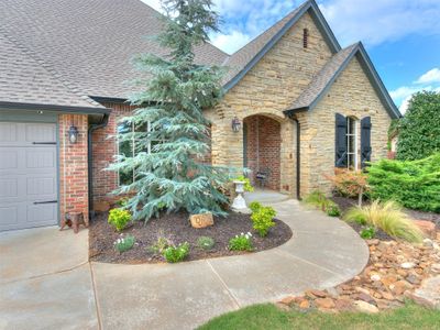 View of front of house with mature trees | Image 2