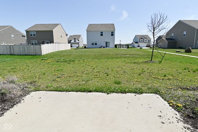 view of yard with a residential view and fence | Image 50
